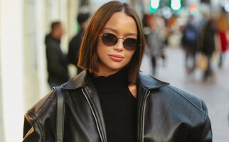 woman wearing sunglasses and black leather jacket