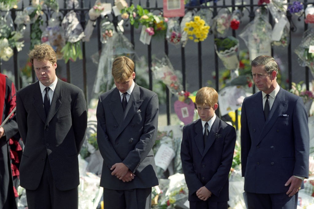 Prince Charles, Earl Spencer, Prince Harry and Prince William walk slowly behind the funeral cortege of Diana, the Princess of Wales