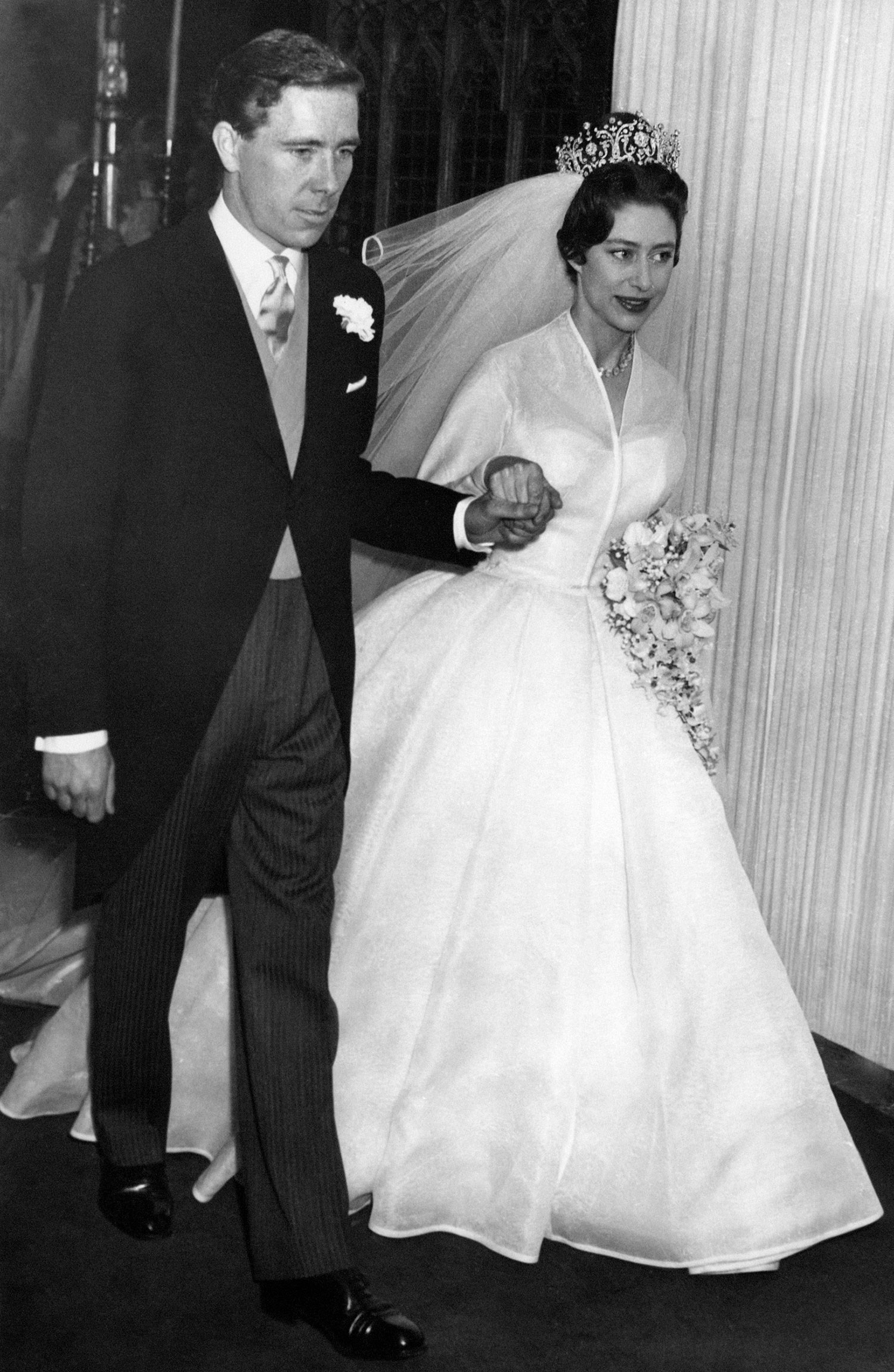 Princess Margaret with her husband, photographer Antony Armstrong-Jones at London's Westminster Abbey on their wedding day, May 6, 1960