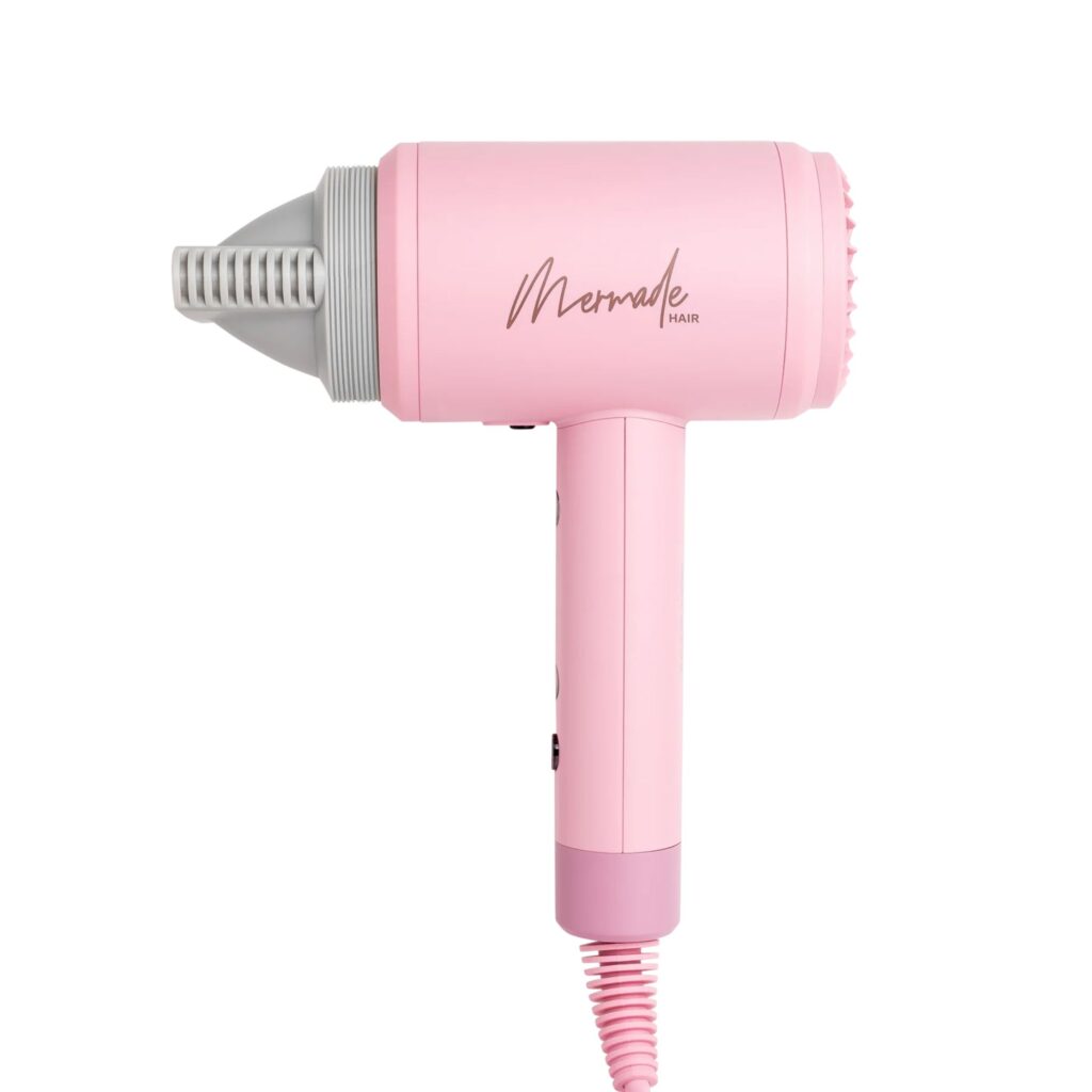 The Mermade Ionic Hair Dryer is bubblegum pink and uses ionic technology to help hair hold it's moisture and shine. 