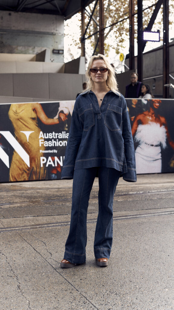 fashion week attendee in denim top and pants