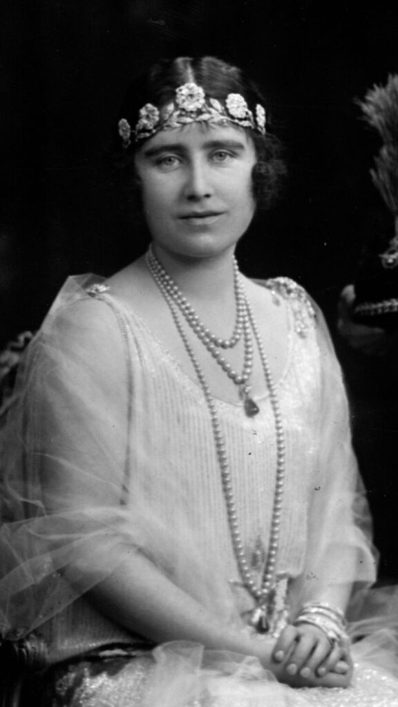 The Queen Mother wears the Strathmore Rose tiara on her wedding day.