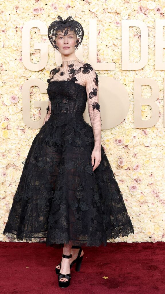 Rosamund Pike wears Christian Dior FW19 Couture to the 2024 Golden Globes. 