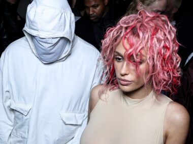 Bianca Censori in a nude coloured leotard, with Kanye West in an all-white outfit that covers his face at the Prototypes Menswear Spring/Summer 2025 show as part of Paris Fashion Week on June 19, 2024 in Paris, France.