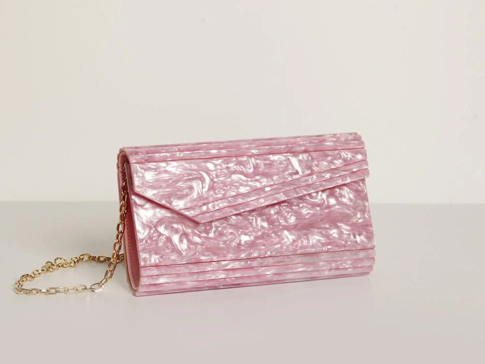 The Electra Purse in Pink from Respiro Studio is a glamorous bag you could also take travelling