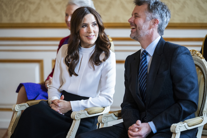 Queen Mary and King Frederik X were laughing and talking together at an event in Copenhagen in March 2024