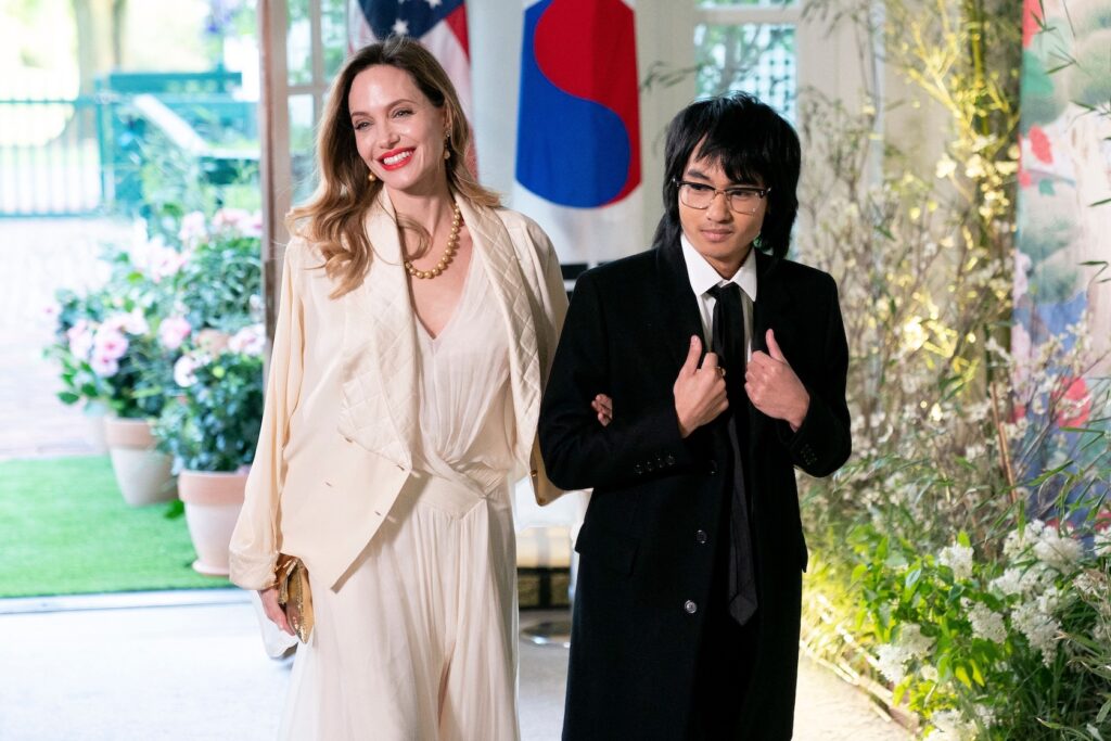 Angelina Jolie and Maddox Jolie-Pitt attending a White House state dinner.