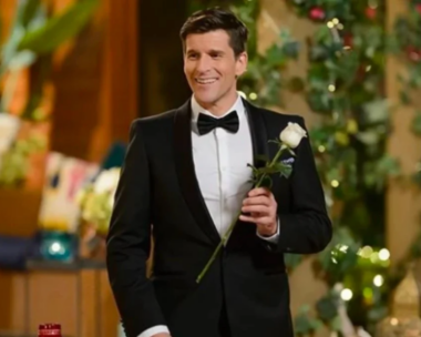 osher holds a rose on the bachelor australia