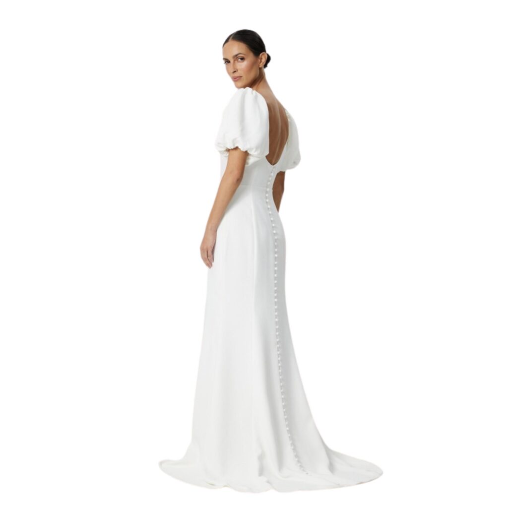 Chancery focuses on traditional silhouettes, such as puff sleeves, nipped bodies, and sweeping skirts, all at a super affordable price point. Most of their dresses are in the $400.00 range, making them a go-to for the budget-conscious bride.  