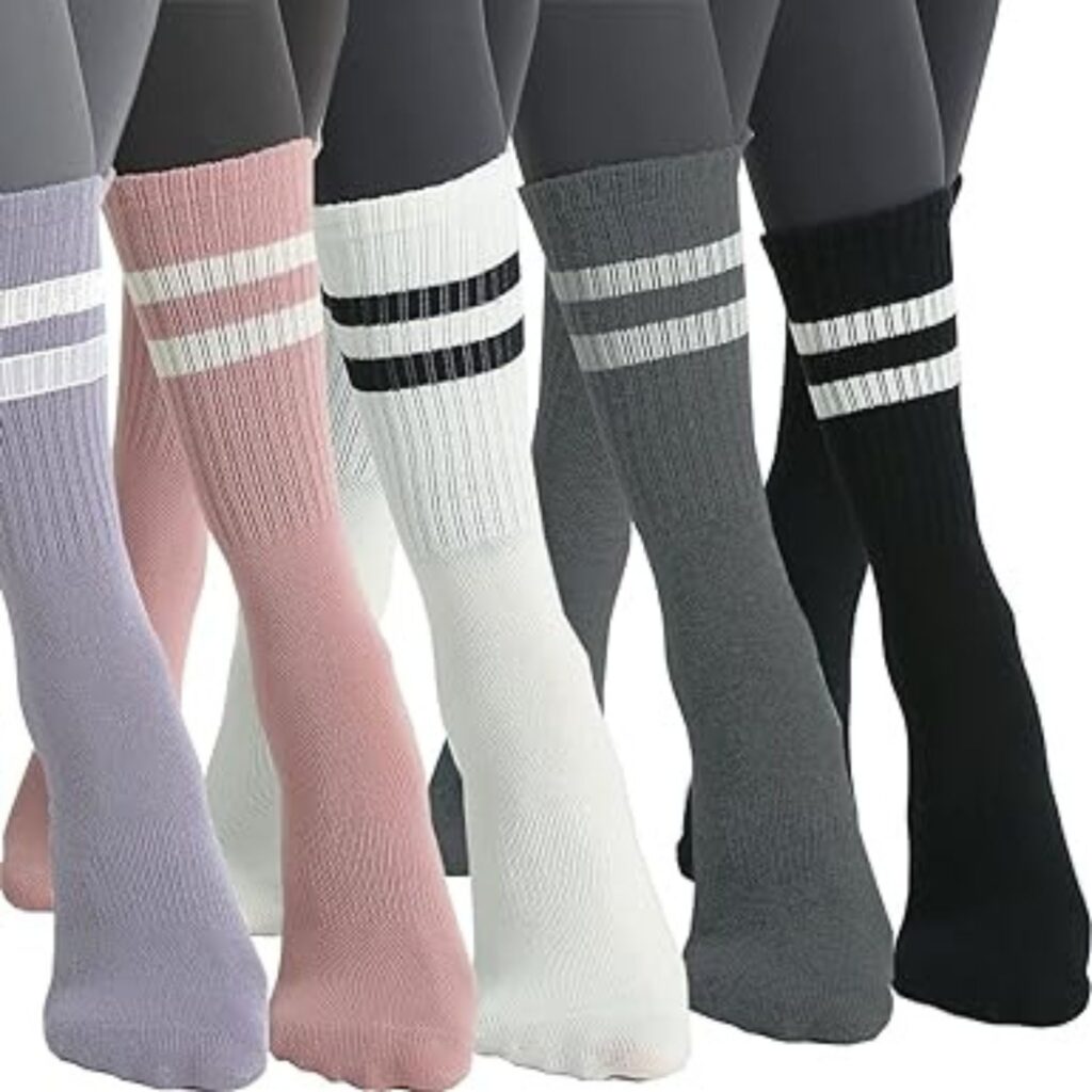 These crew style pilates socks for women from Amazon hit lower mid calf and have a sporty two stripe feature (think a feminine take on the football sock). Pictured are some of the shades including black, grey, white, pale pink and pale lilac. $35.99 from Amazon. 