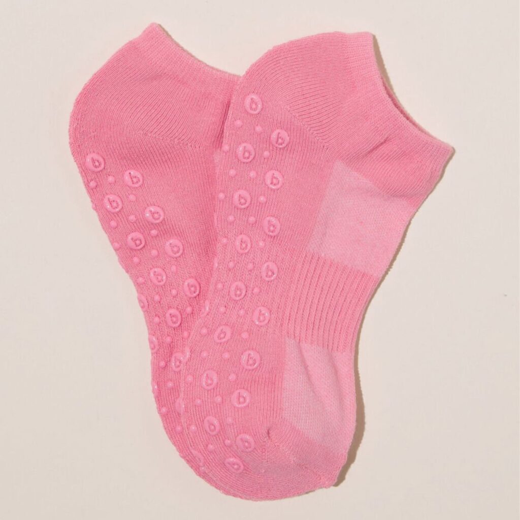 The affordable Performance Studio Sock from Cotton On comes in a range of shades including black, white, radiant rasberry (a bright true pink, pictured) and windsurfer, a pale blue. There is one to match any active wear set. They feature a low ankle, breathable anti-odour fabric and arch support.