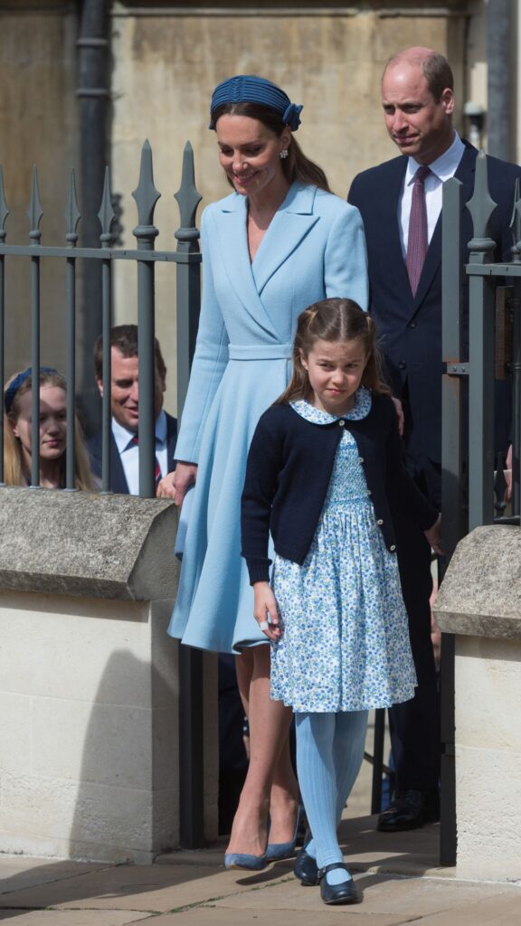 Kate Middleton and Princess Charlotte in matching blue dresses.