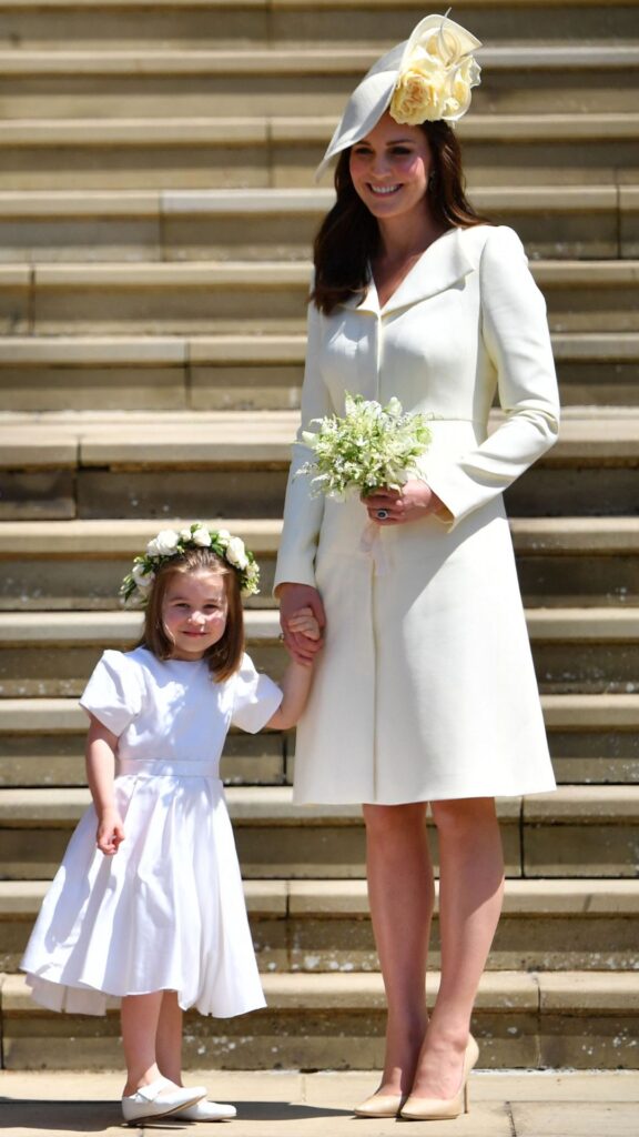 Kate Middleton and Princess Charlotte at Meghan and Harry's wedding in 2018. 