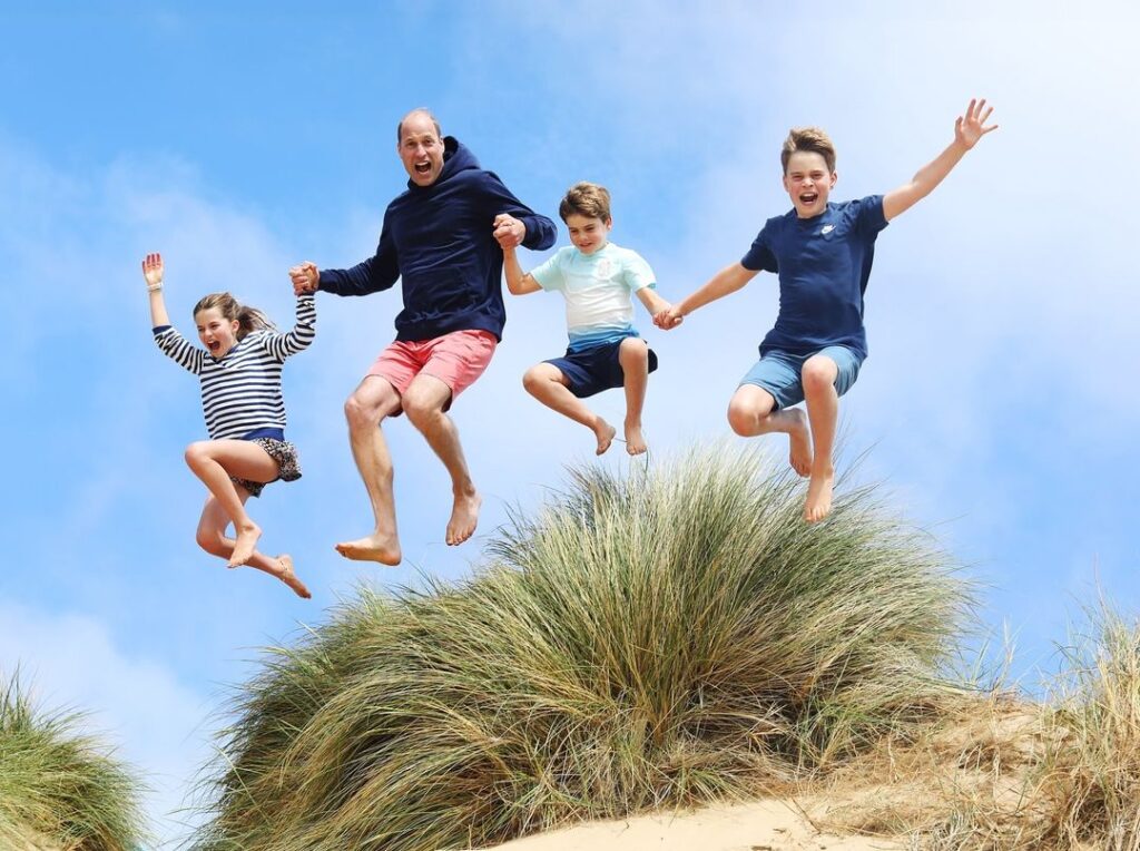 Photo of Prince William with his children, George, 11, Charlotte, 9, and Louis, 6.