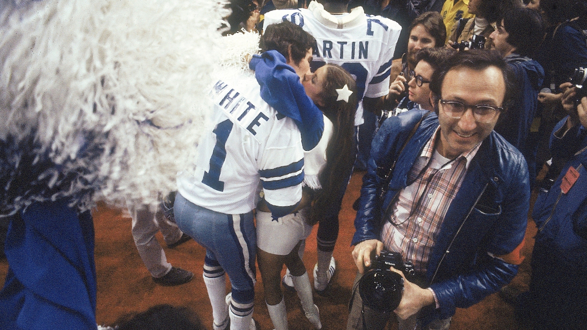  Football: Super Bowl XII, Dallas Cowboy backup QB Danny White (11) victorious, kissing cheerleader after winning game vs Denver Broncos, New Orleans, LA 1/15/1978