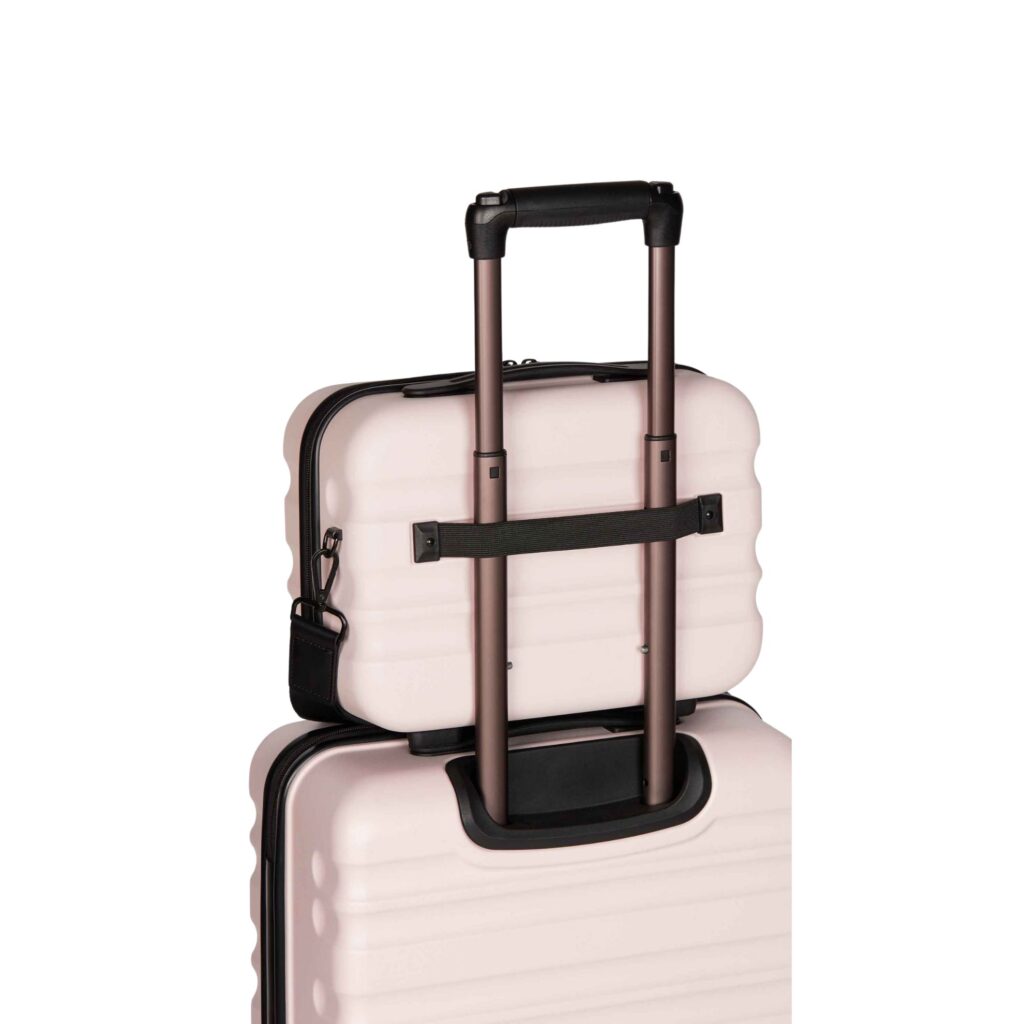 The Clifton features internal dividers and pockets to keep toiletries secure, powder-coated hardware, a top handle for easy grip and an adjustable detachable shoulder strap. If you own Antler luggage, the Clifton also features a back sleeve that slots conveniently over the suitcase handle. Pictured here attached to the suitcase. 