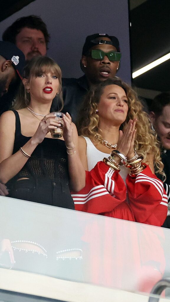 Rapper Ice Spice, singer Taylor Swift and actress Blake Lively react prior to Super Bowl LVIII between the San Francisco 49ers and Kansas City Chiefs at Allegiant Stadium on February 11, 2024 in Las Vegas, Nevada. 