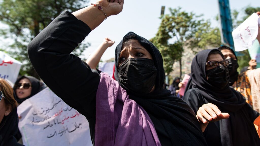 Taliban fighters fired into the air as they dispersed a rare rally by women as they chanted "Bread, work and freedom" and marched in front of the education ministry building, days ahead of the first anniversary of the hardline Islamists' return to power, on August 13, 2022 in Kabul, Afghanistan. The collapse of the economy and the freezing of Afghan and donor funds after the Taliban takeover of the country in August 2021 created a humanitarian crisis. Most art, culture and pastimes have been banned. The female population have also had to quit jobs and young girls after the age of 12 can no longer go to school or complete further education.