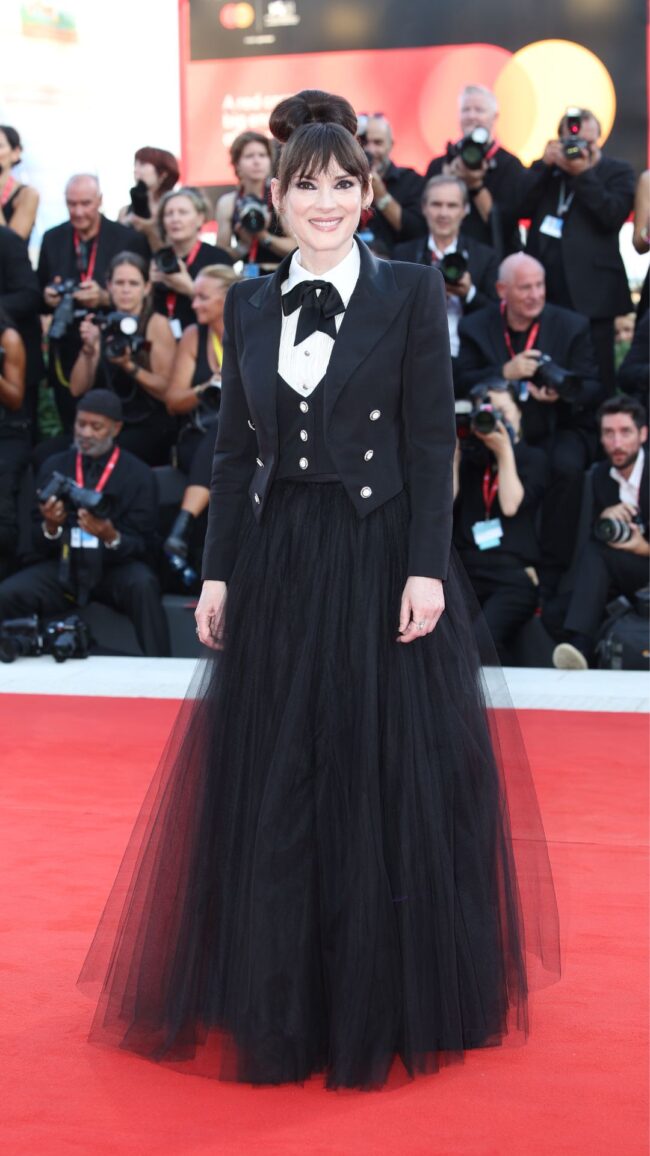 winona ryder in a black tuxedo jacket and tulle skirt at the venice international film festiva