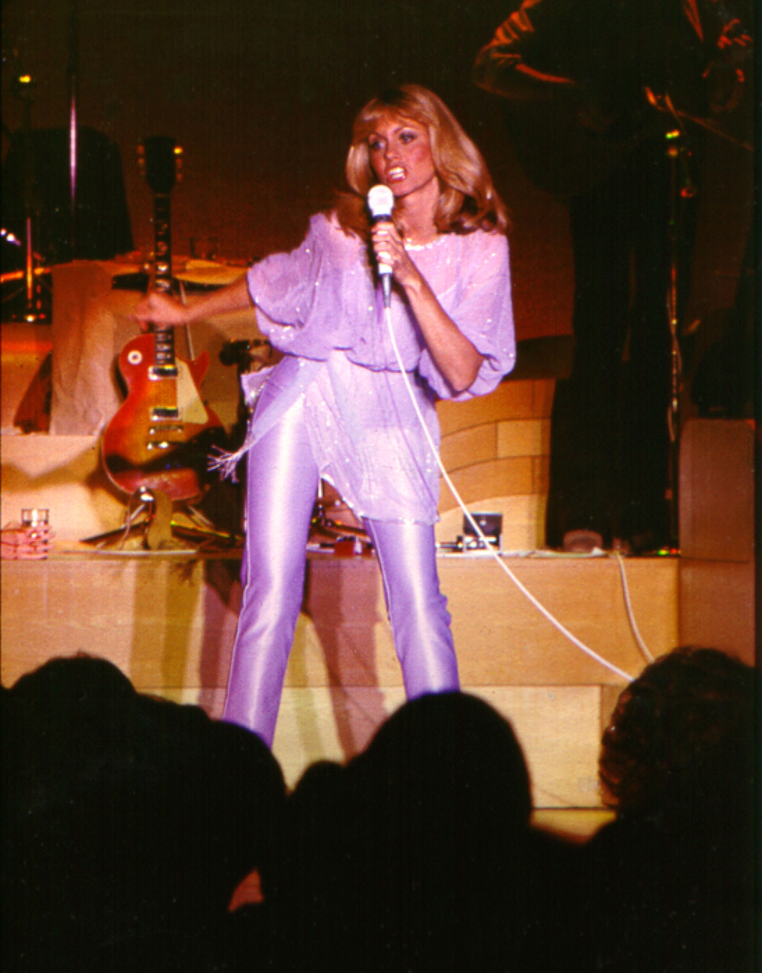 Olivia-newton-John-purple-outfit