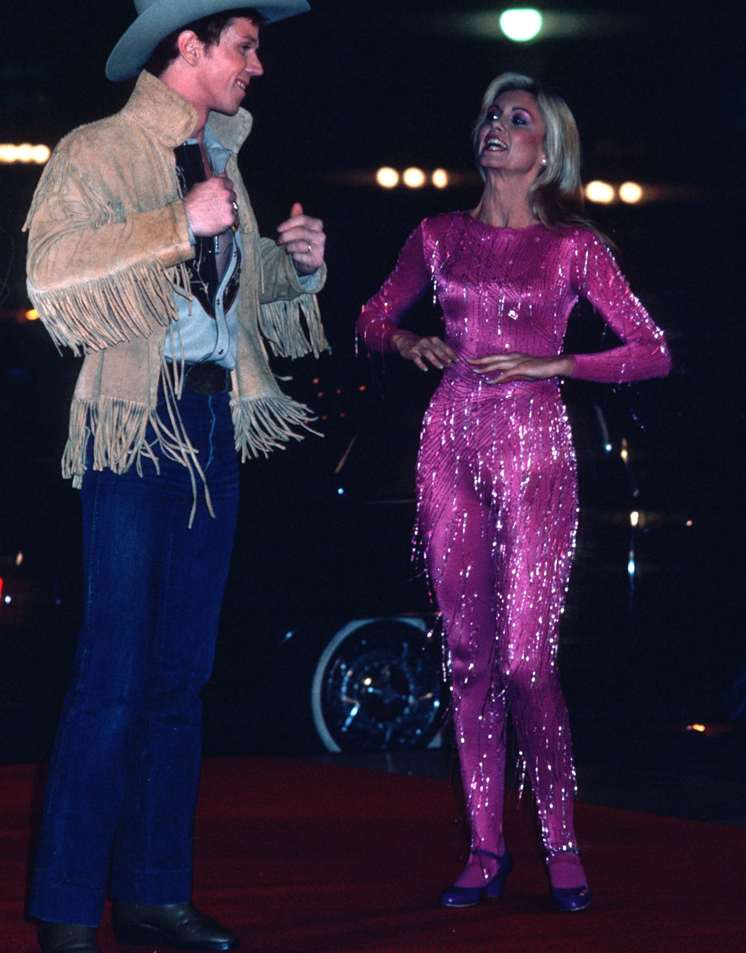 Olivia-newton-John-purple-jumpsuit