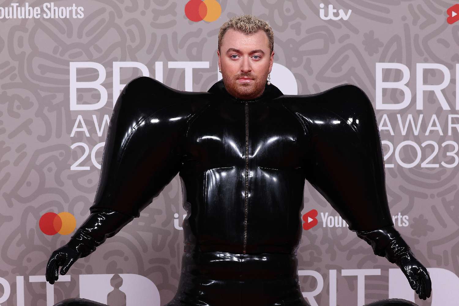 Sam Smith’s Viral BRIT Awards Outfit Has A Deeper Meaning Behind It