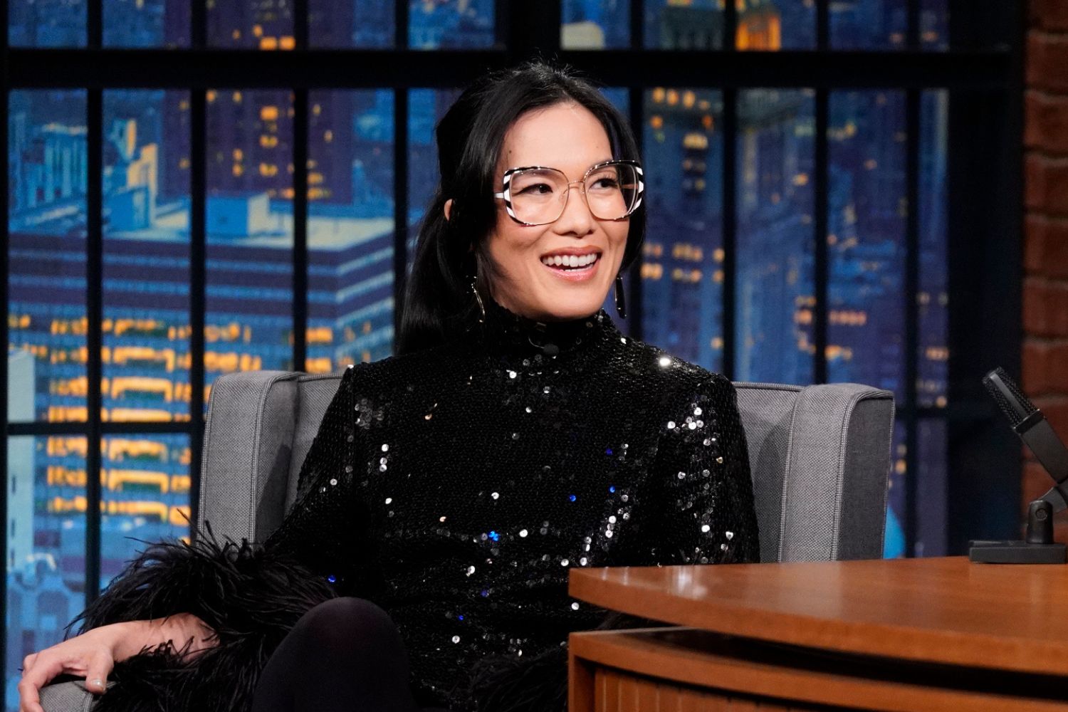 ali-wong-in-black-sequined-dress-on-talk-show-couch