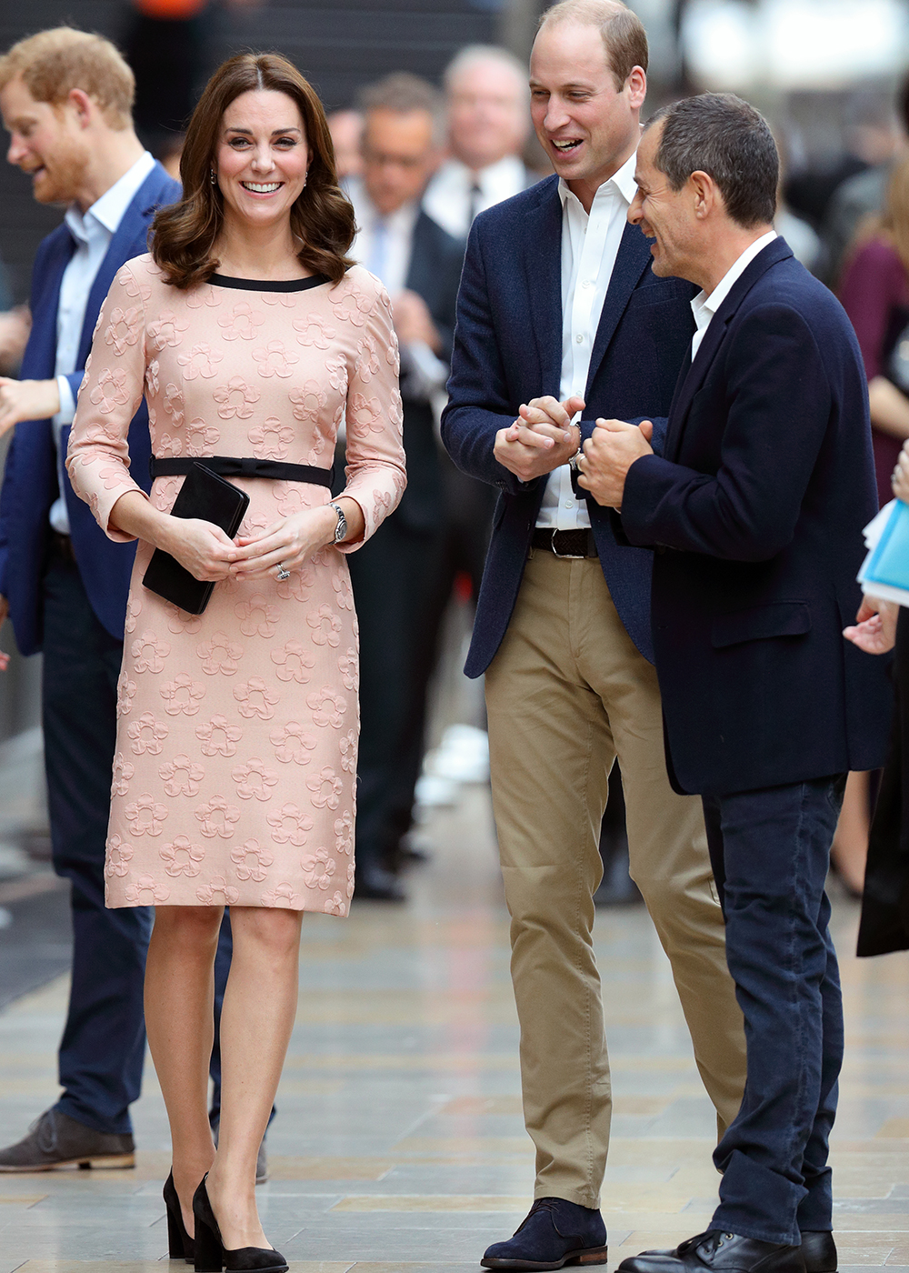 Kate Middleton Shows Baby Bump, Dances With Paddington Bear