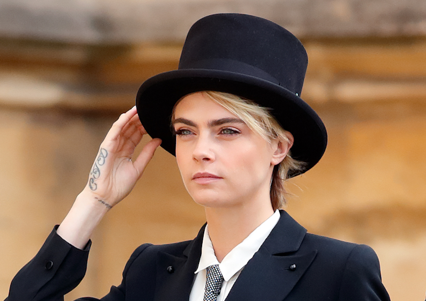 The Secret Story Behind The Suit Cara Delevingne Wore To Princess Eugenie’s Wedding
