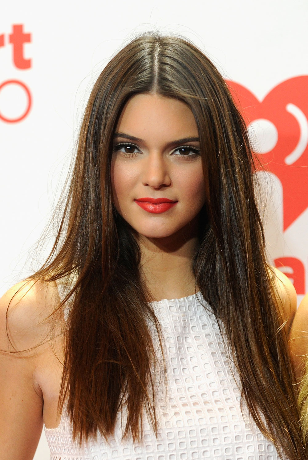 Kendall Jenner in 2013, when she had highlights in her hair and full lips