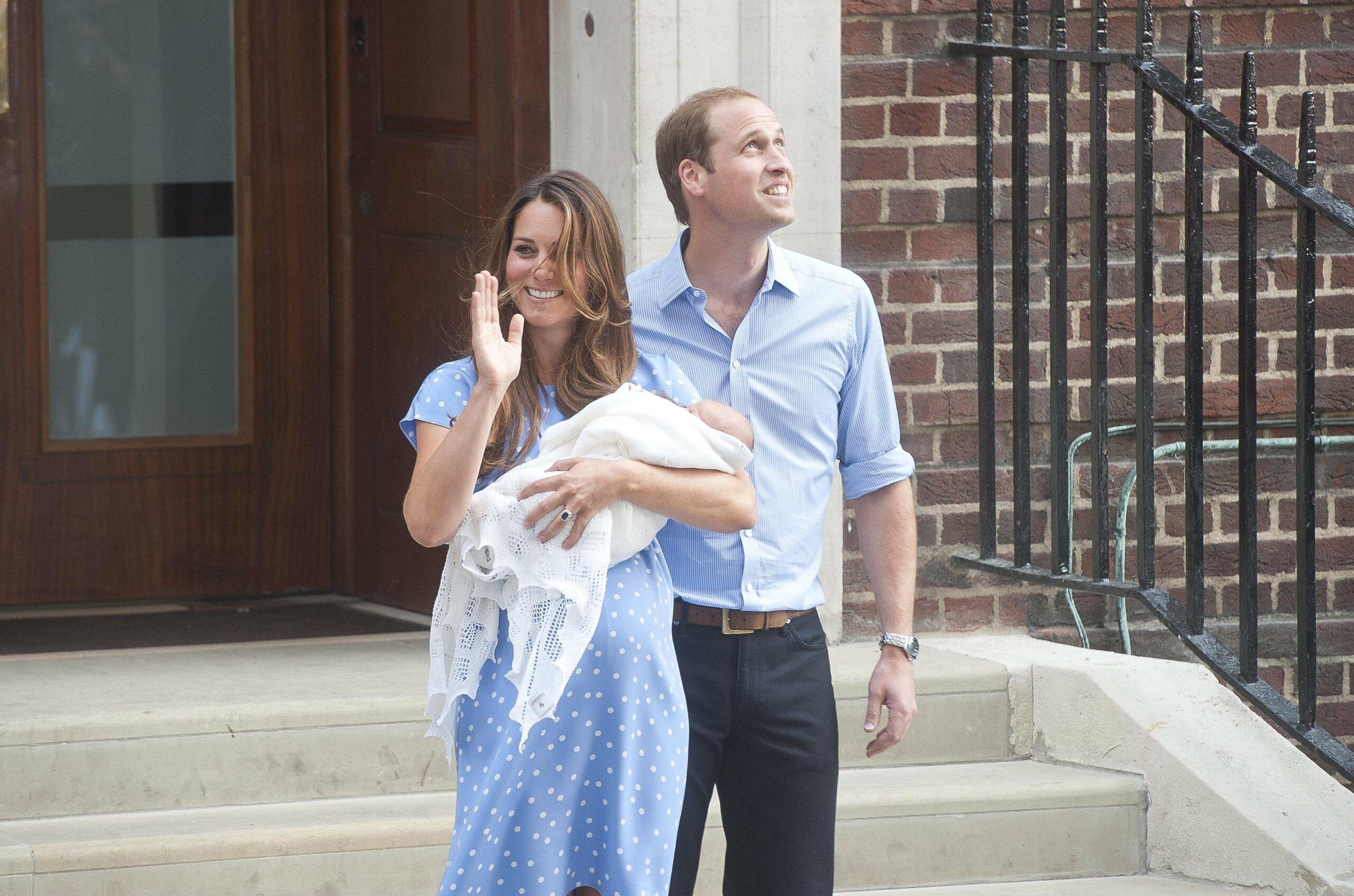 Kate Middleton and Prince William with Prince George on July 22, 2013