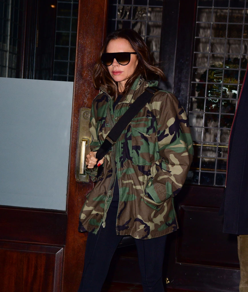 Victoria Beckham spotted swearing stirrup pants and a camo jacket