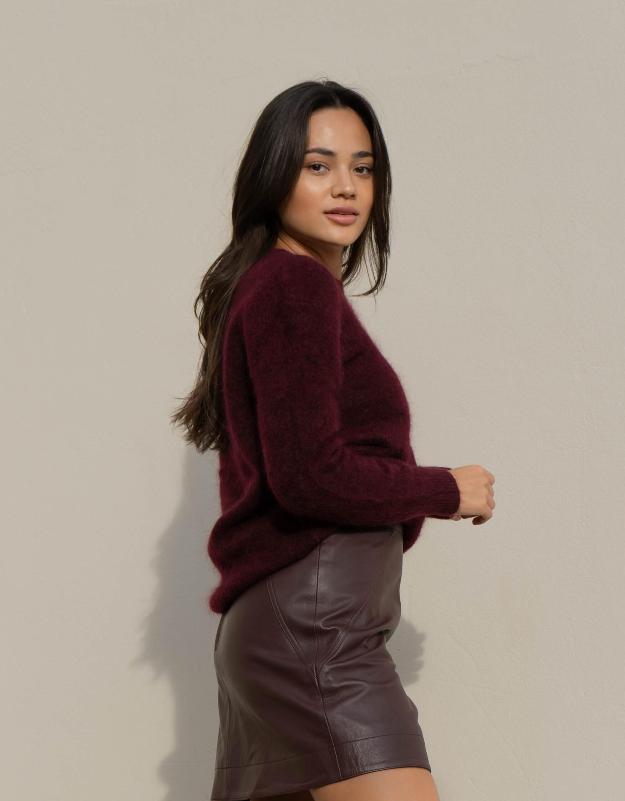 Leather A-line mini skirt, $199.95; Mohair crew neck sweater, $189.95; both Seed Heritage, available at Myer.